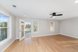 Primary bedroom with private deck with amazing water views