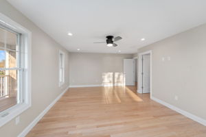 Long View of Primary Bedroom. The open door is to a huge walkin closet