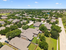 No rear neighbors and home is located on a short street near the main entrance of the subdivision and in walking distance to Elm Grove Elementary.