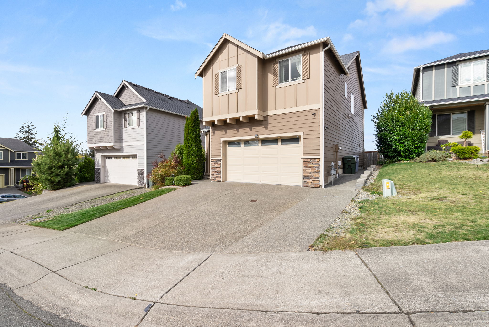 Expanded driveway provides additional off-street parking.