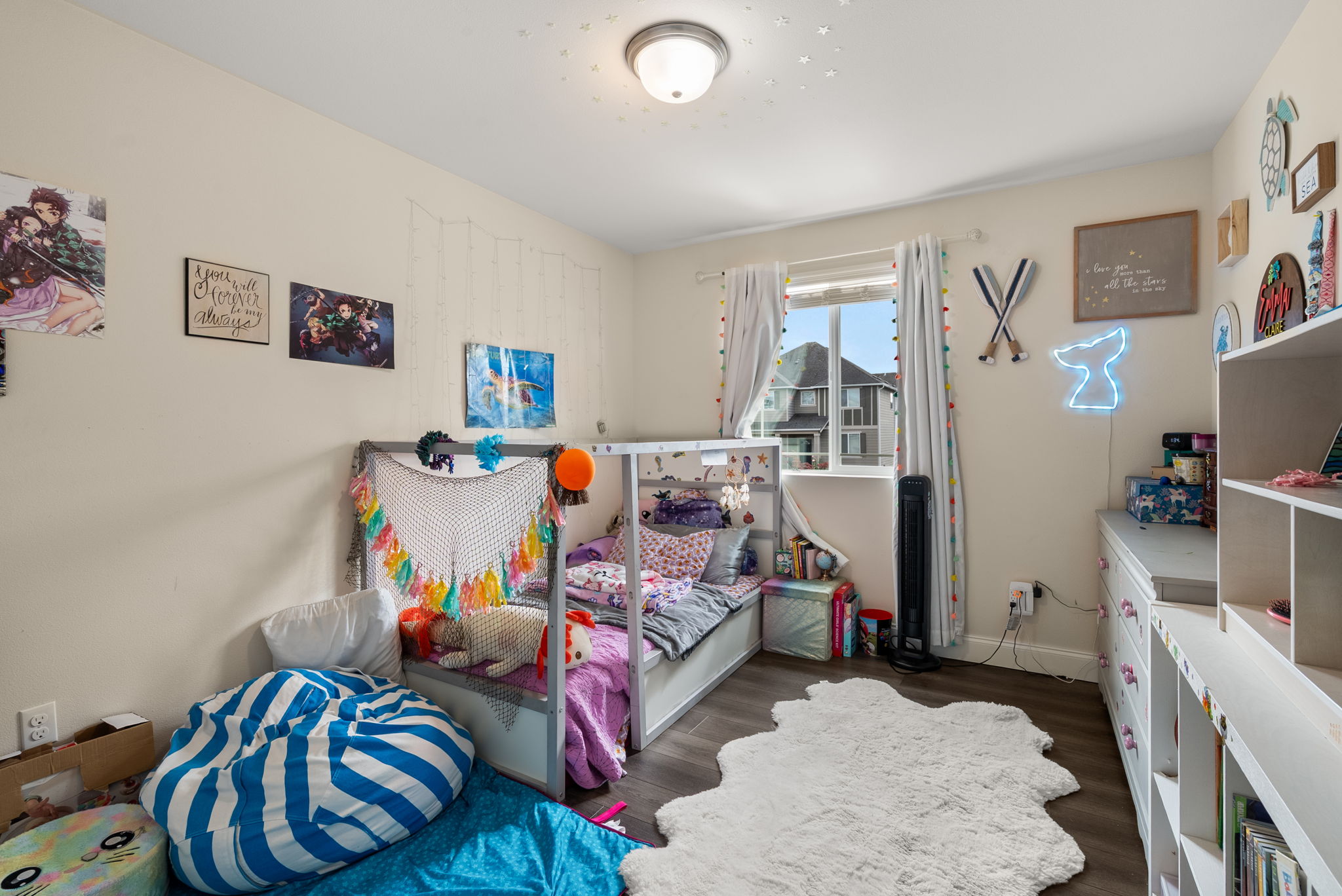Bright secondary bedroom with generous floor space.
