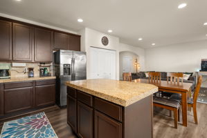 Large kitchen island adds valuable prep space and additional storage.