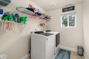 Convenient upstairs laundry room with washer and dryer included.