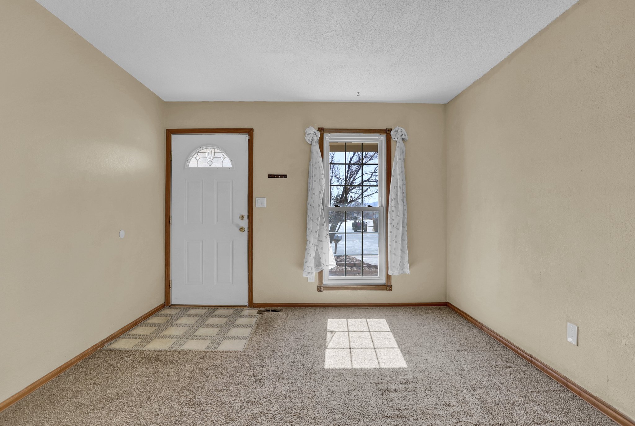 The entry and living room.