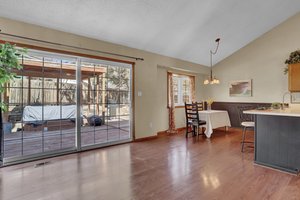 Sliders lead to the back deck.