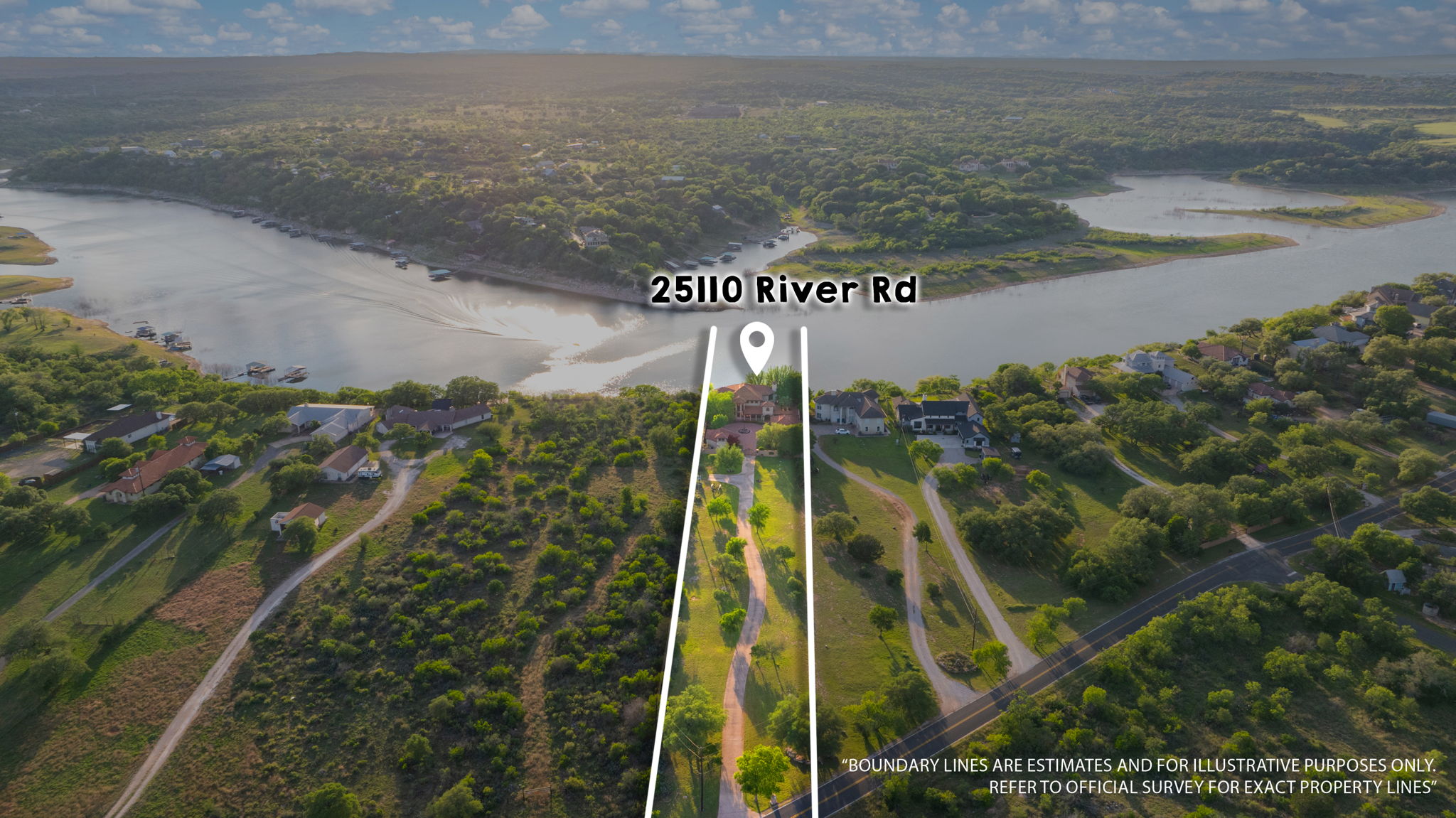The property features an extensive lot with a private driveway, a lush green landscape, and direct access to the water.