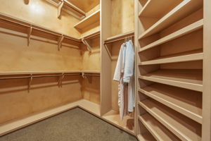 Primary Bedroom sizable closet with various shelfing options.