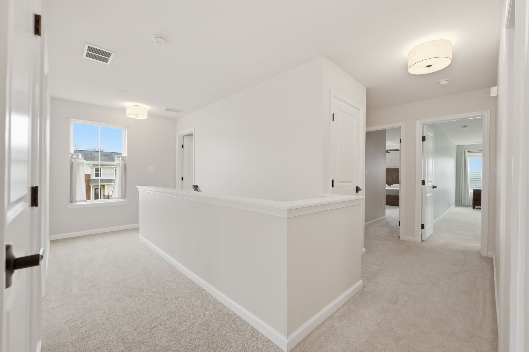 Upstairs landing with 5 BR and laundry