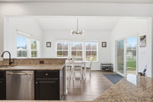 Kitchen with view of door to patio