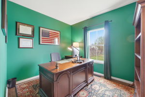 Office on main level behind kitchen