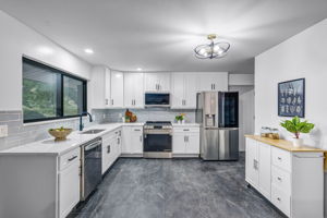 Kitchen - new flooring, stainless appliances