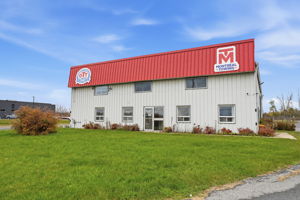Front and side elevation with office and service areas.