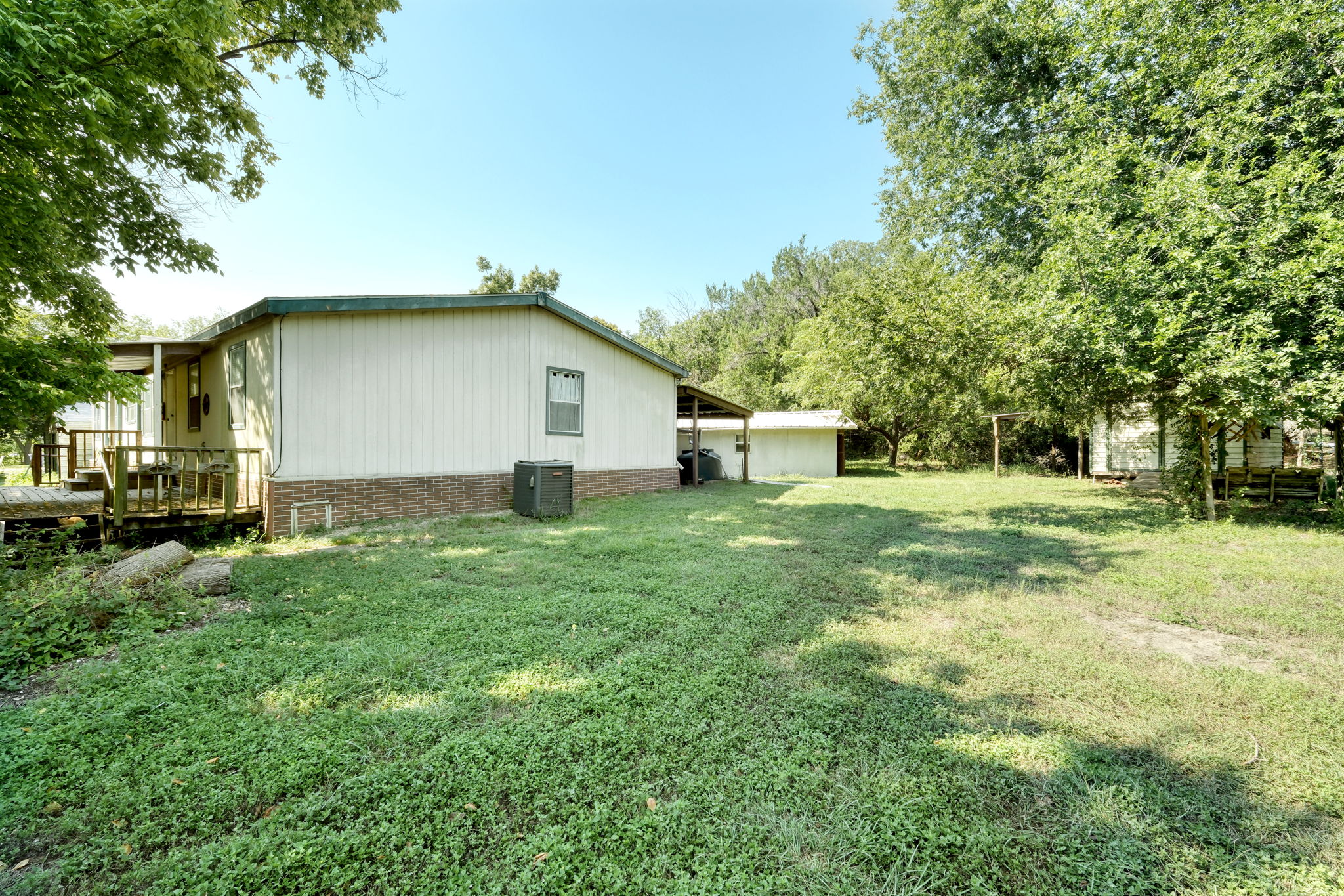 Side of Home/Outbuildings