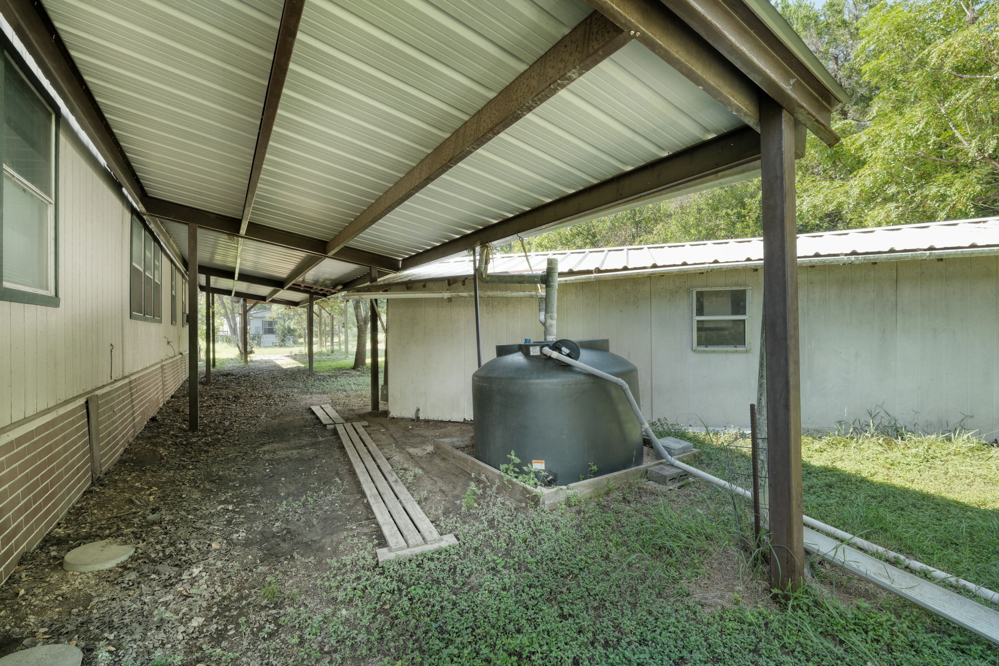 Back of Home/Water Catchment