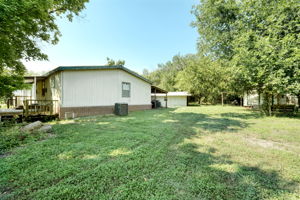 Side of Home/Outbuildings