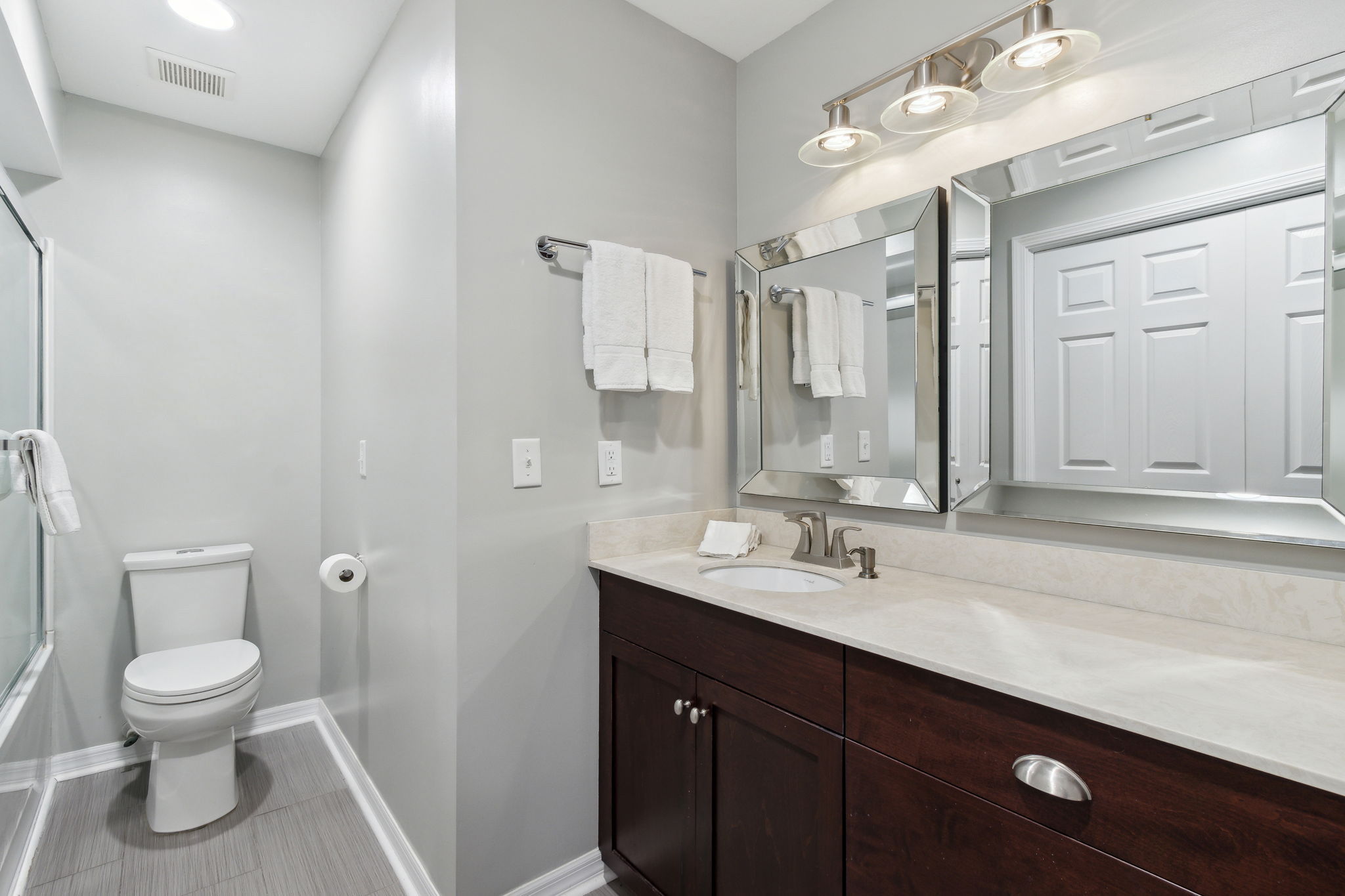 The master bath has plenty of vanity storage...