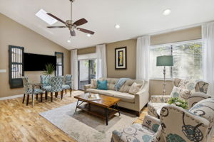 The family room's vaulted ceiling adds to the spacious feel of the unit.