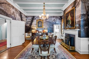 Formal Dining Room features a fireplace and coffered ceiling