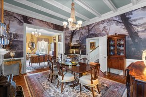 The Dining Room boasts a beautiful custom mural depicting the Potomac river (located blocks from the home!)