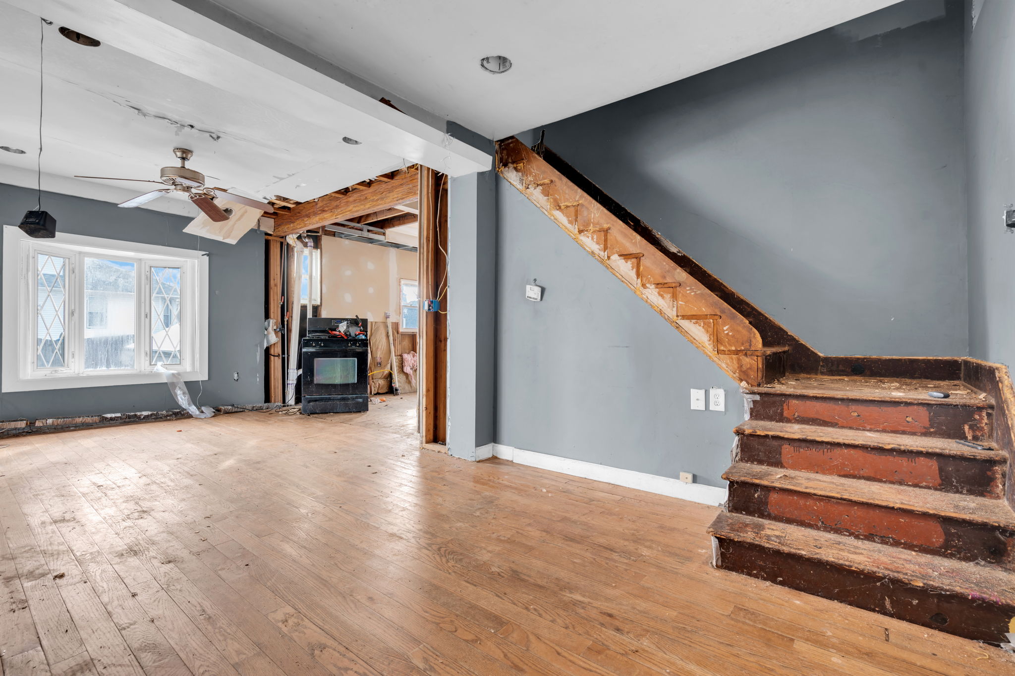 Den area with steps to 2nd floor