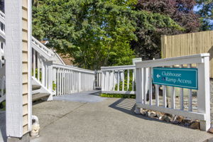 Clubhouse ramp Access to upper floor gathering hall, outdoor patio, and facilities.