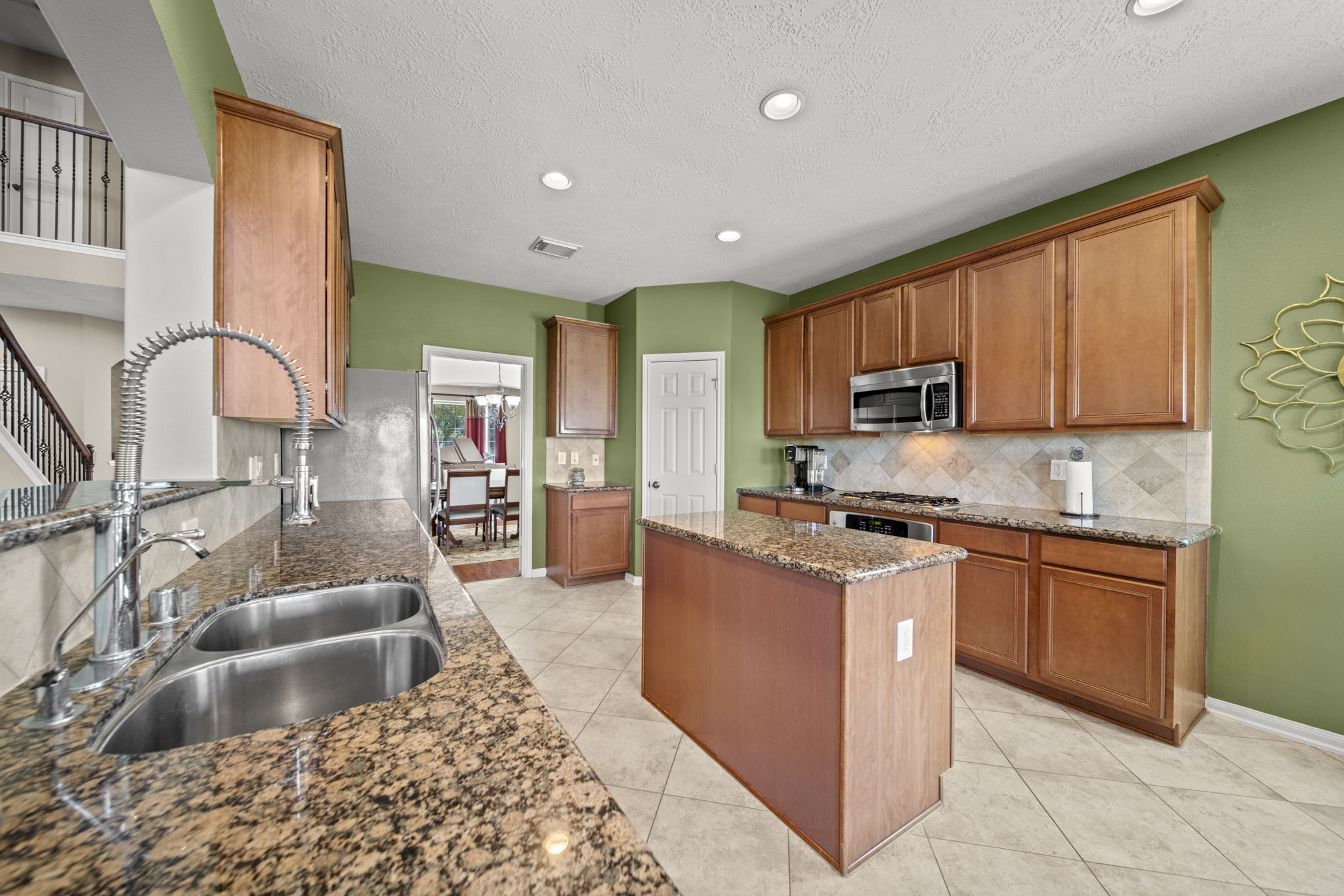 Enjoy Granite countertops, stainless steel appliances and an undermount sink!