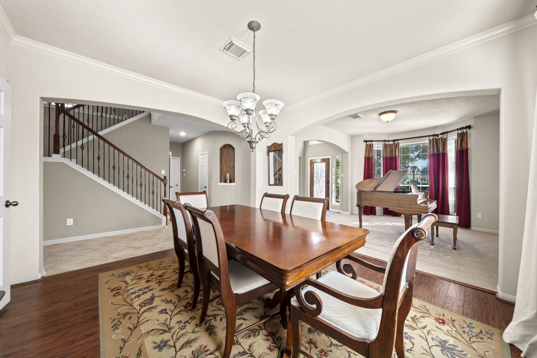 The dining room is completely open to the family room.