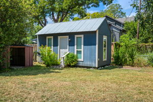 Outdoor shed with electrical and window unit