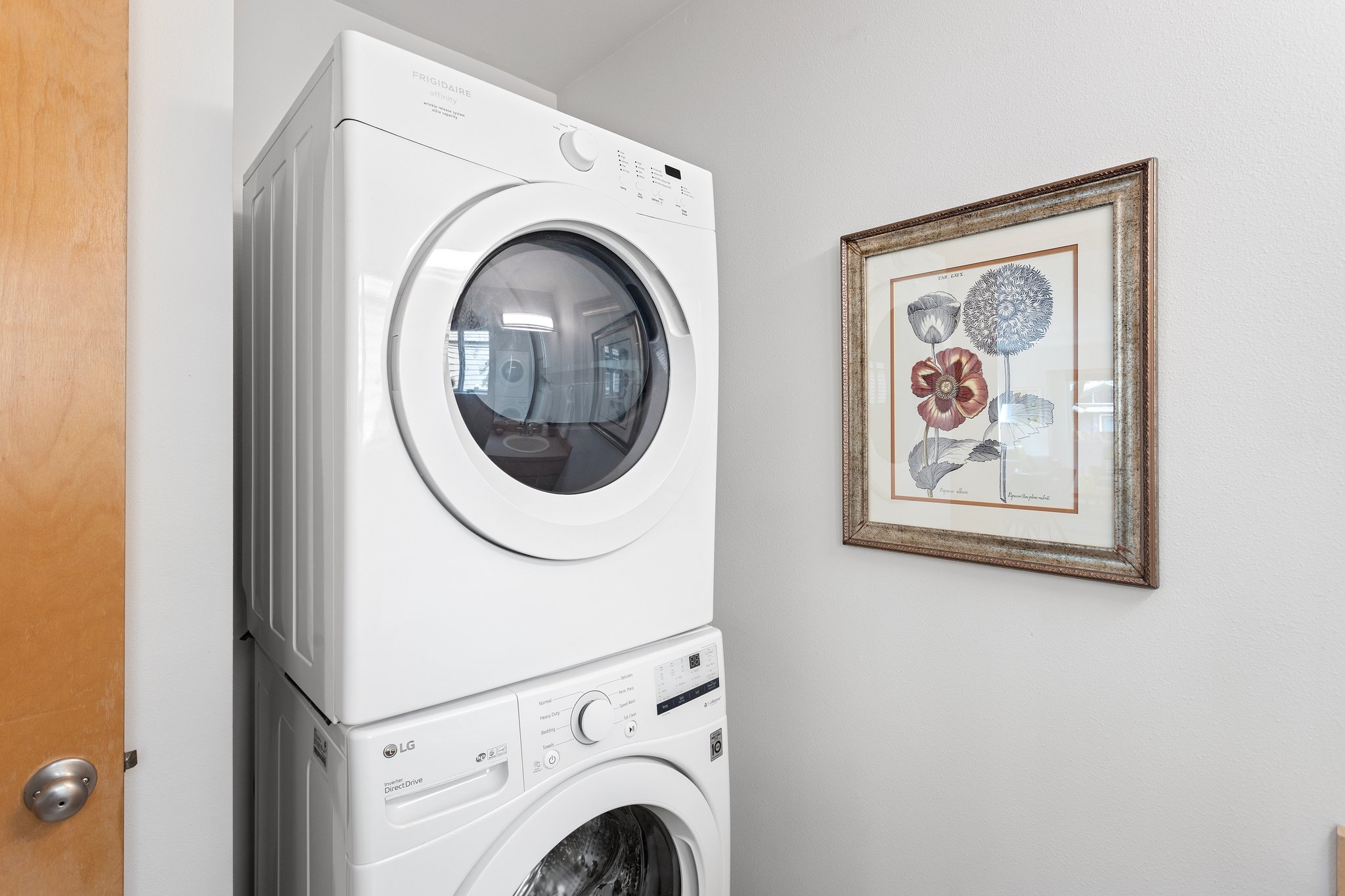 …a laundry area with a washer and dryer. You’ll love the convenience of having everything you need in one place.