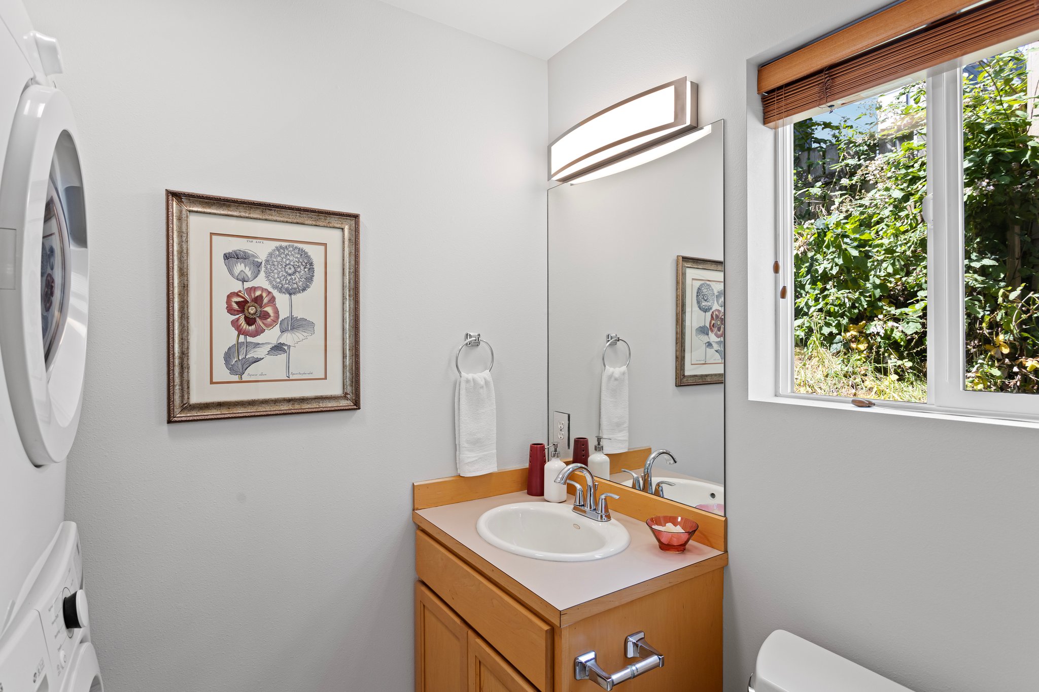 Your guests will appreciate the convenience of the day-lit main floor powder room, featuring…