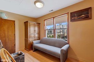 Enclosed heated back porch / bonus room, second floor