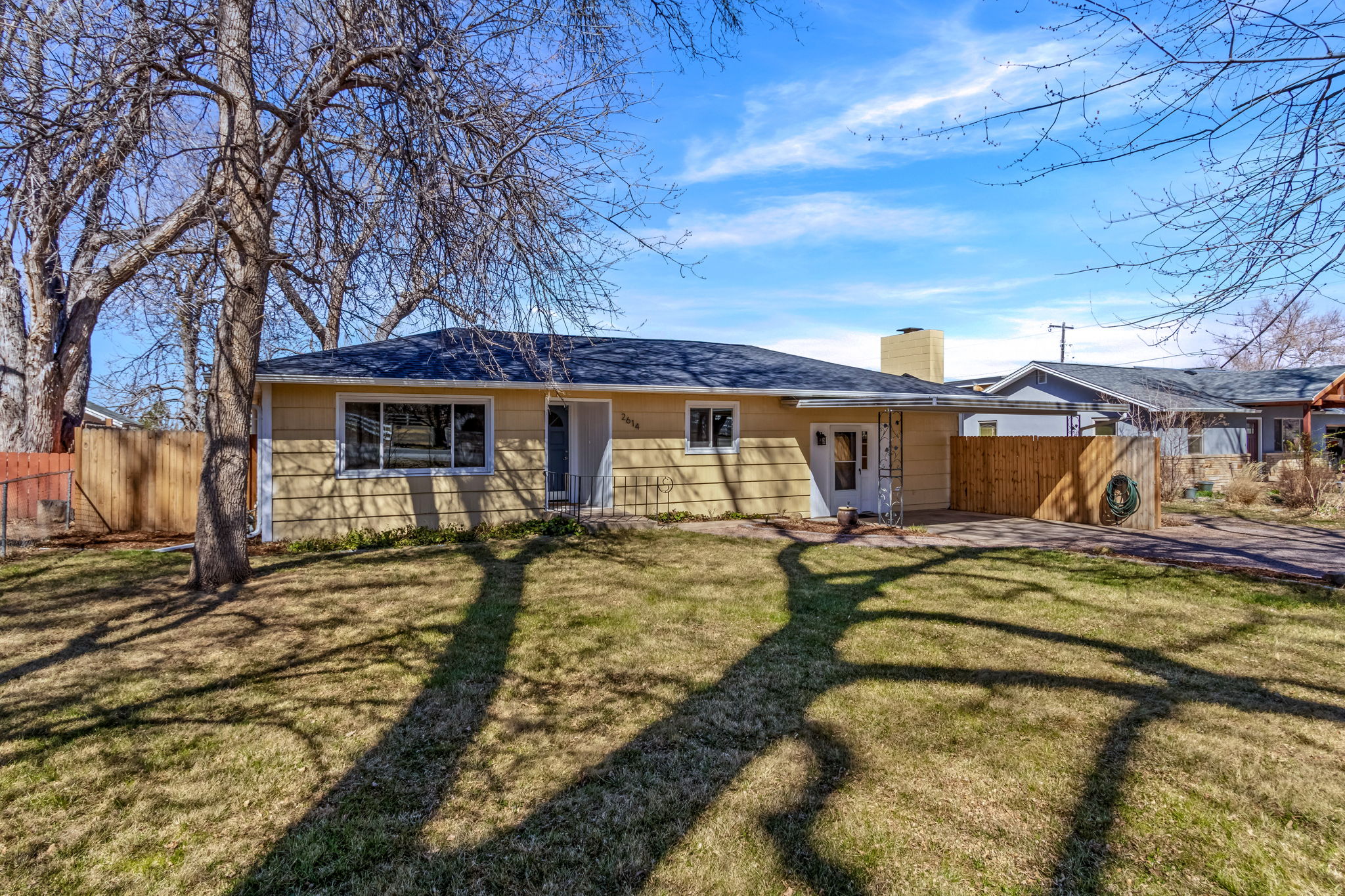 Set back from the road and shaded by mature trees, this home feels like it's in the country but is really just minutes from Old Town and the foothills.