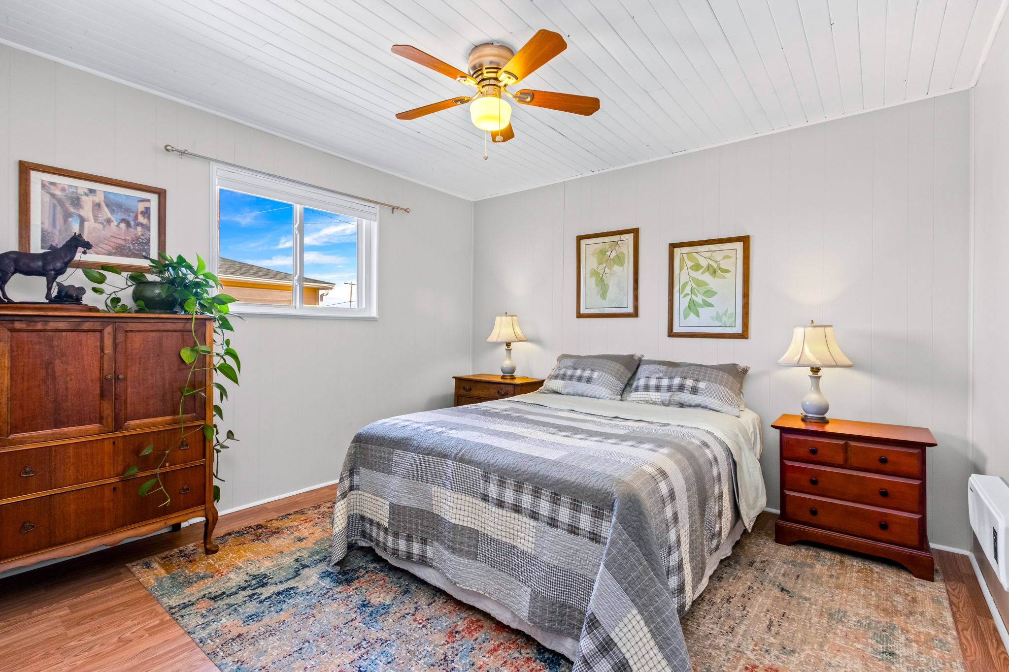Bedroom 2 is located off the family room, overlooking the private back patio and backyard.
