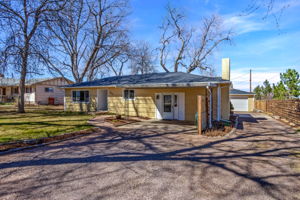 Brand new roof, pre-inspected, move-in ready!  Carport, 1 car detached garage, and lots of driveway space for RV and vehicles - No HOA!