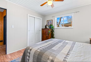 Bedroom 2 is located off the family room, overlooking the private back patio and backyard.