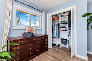 One of two closets in the primary bedroom. This closet organizer makes all the difference!
