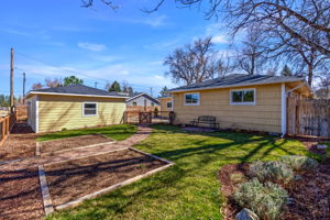 Owners having lovingly refreshed this backyard space. When the growing season hits, everything will be beautifully blooming!