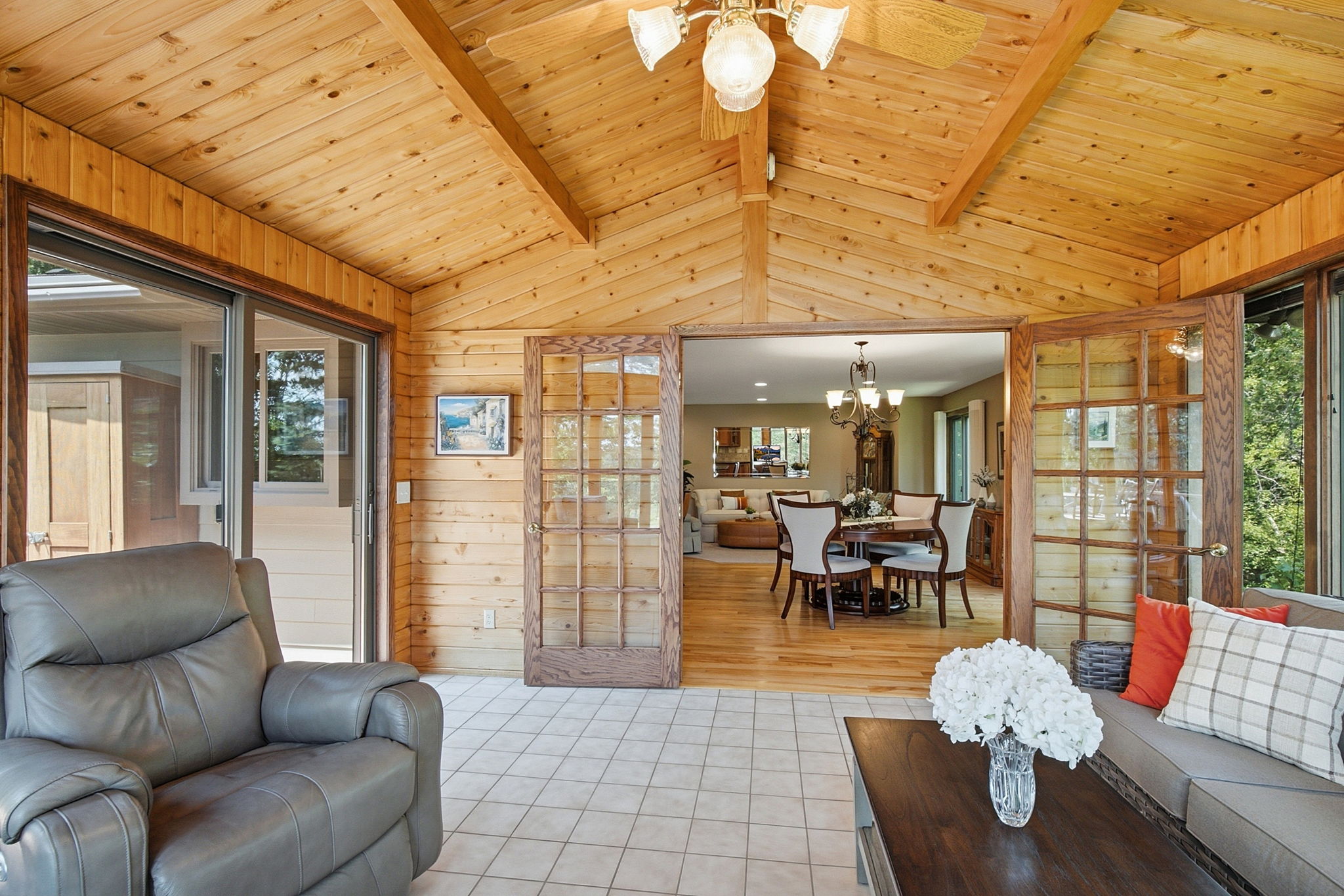 Four-season sunroom with French doors.