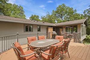 Maintenance-free deck with stairs leading to yard.