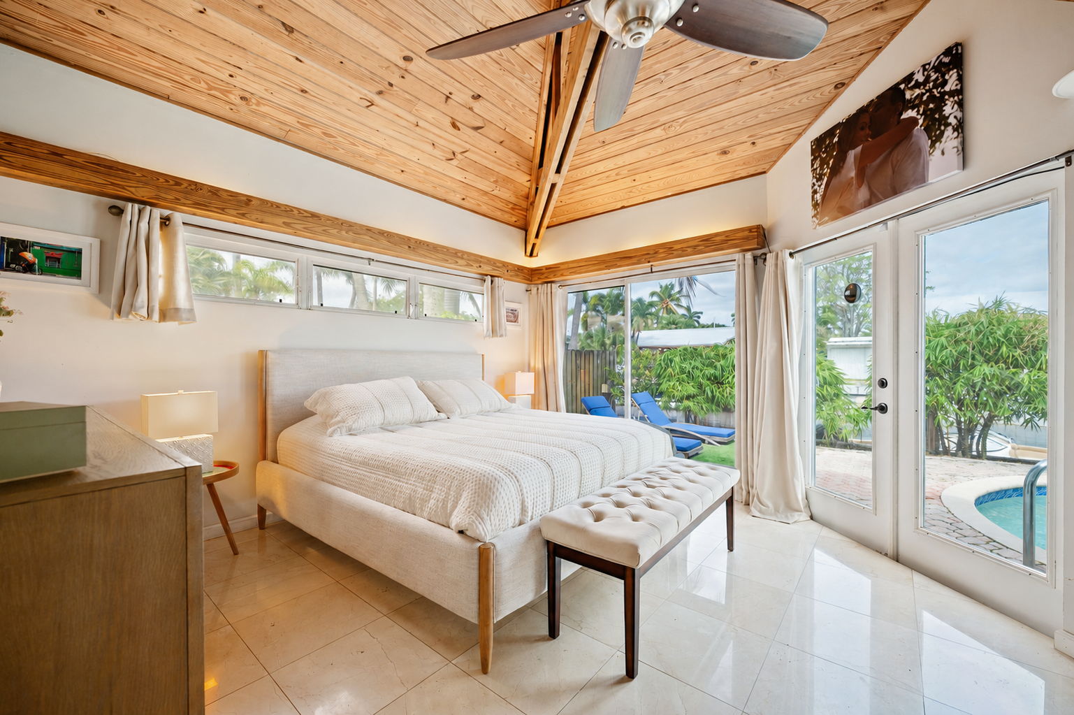Stunning Primary suite with cathedral ceilings and calming natural lighting.