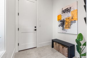 The mud room conveniently connects directly to the attached garage