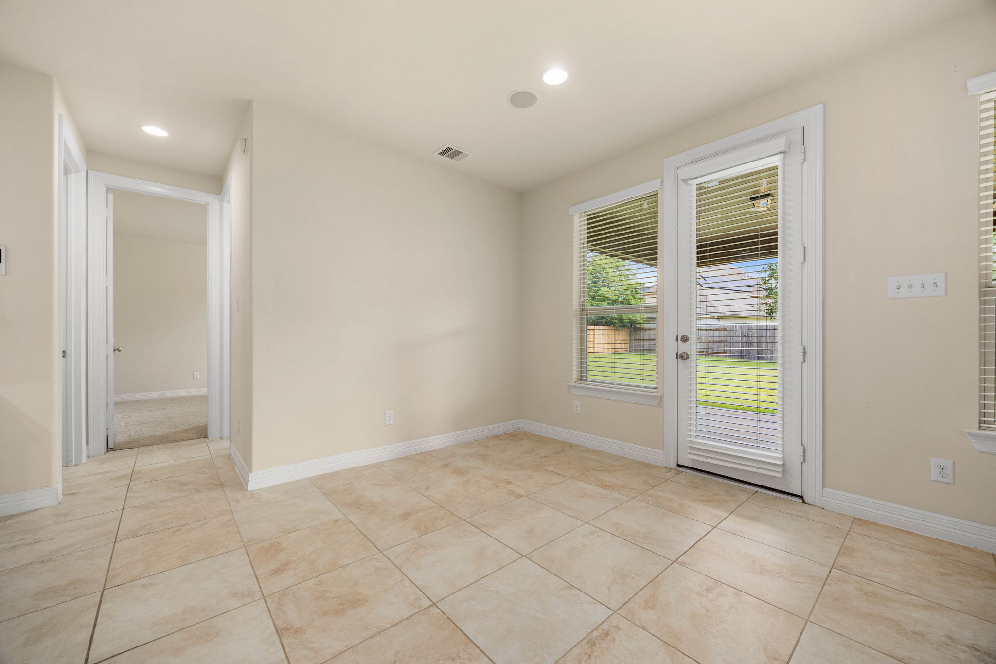 Breakfast nook perfect for enjoying breakfast or coffee while you look out into your backyard.