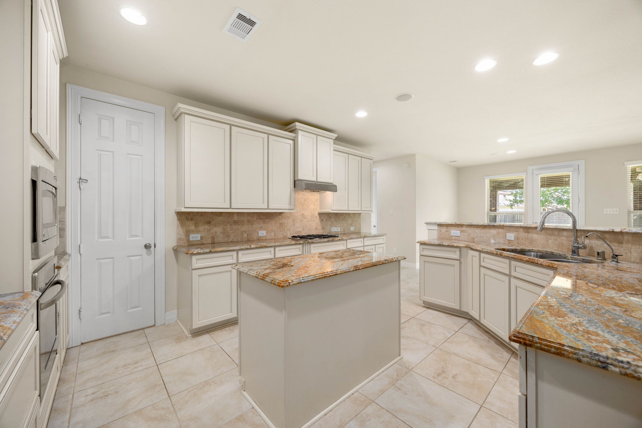Kitchen has walk in pantry