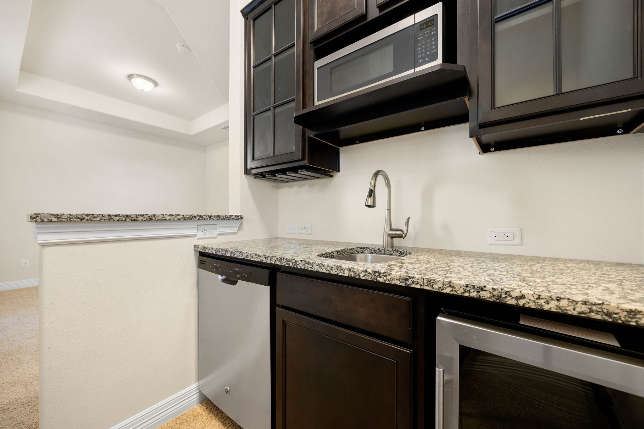 Upstairs primary living room with kitchenette
