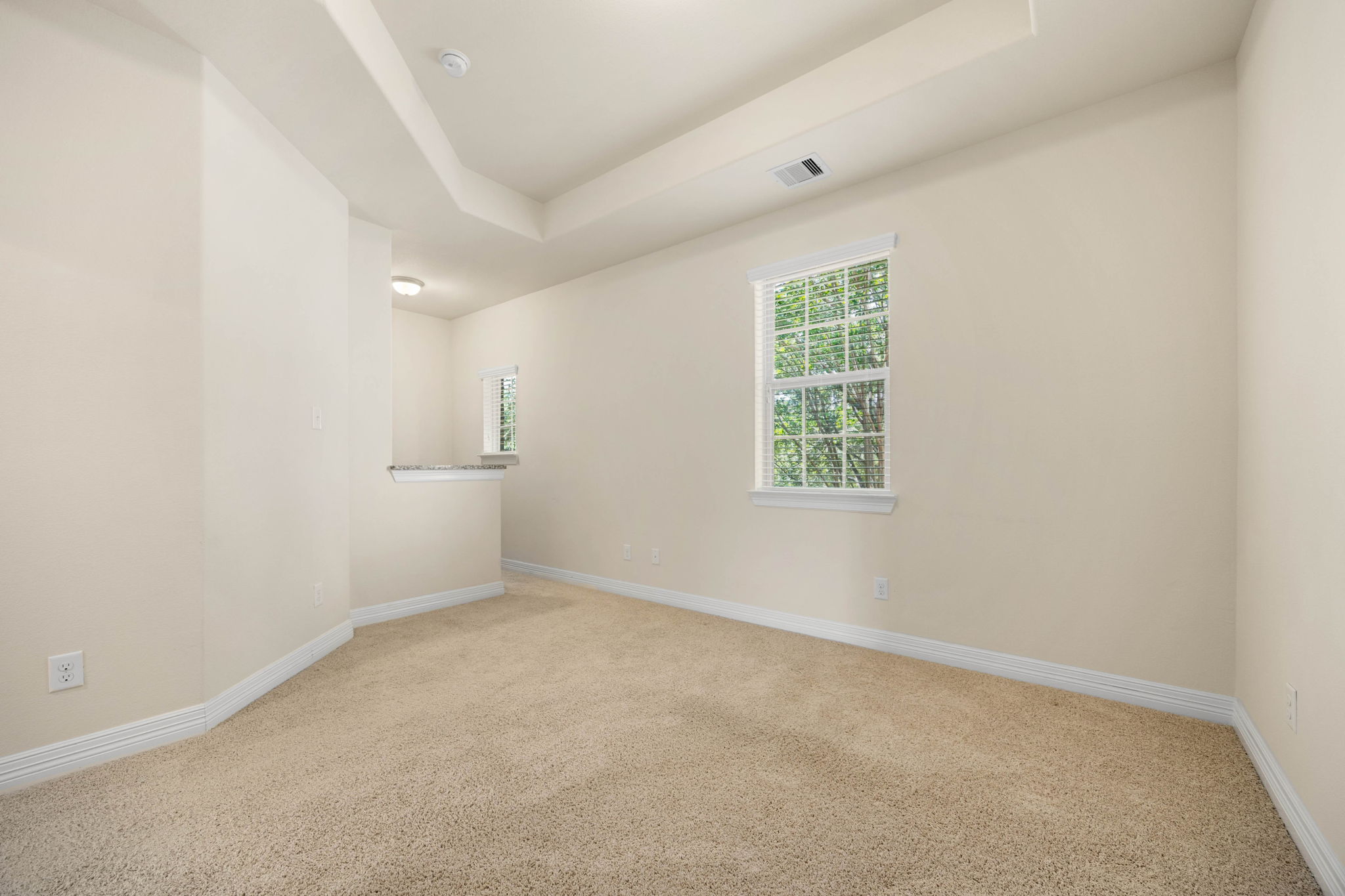 Upstairs primary living room w kitchnette- third angle