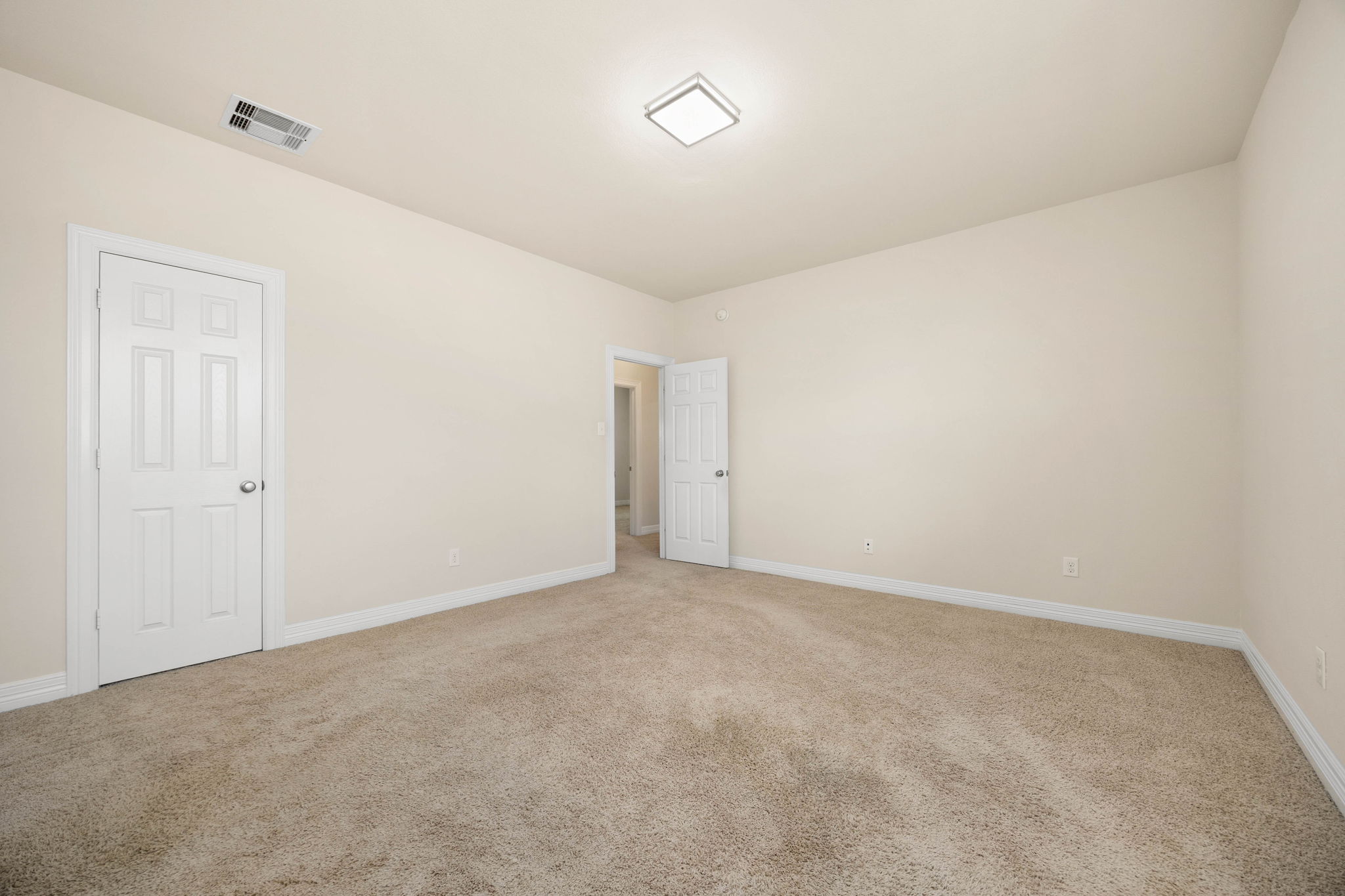 Secondary bedroom up with shared bathroom.