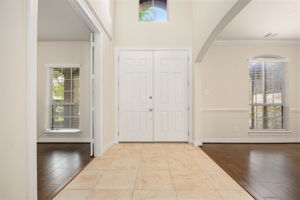 Grand Entrance. Study/Home office directly across from the formal dining room