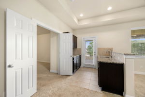 Kitchenette in Gameroom with sink and plenty of storage!