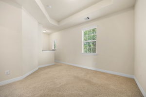 Upstairs primary living room w kitchnette- third angle