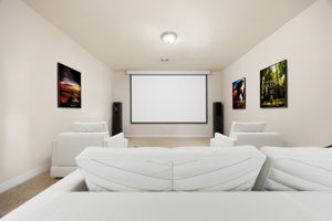 Media Room upstairs featuring two storage closets. . Off gameroom